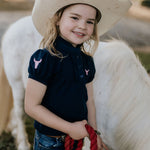 Leah navy ruffle polo back view showing relaxed feminine fit in classic navy colourway