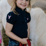 Leah classic navy ruffle polo front view showing elegant ruffle collar in classic navy with sophisticated detail