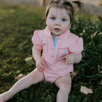 Kiki Baby baby pink polo romper flat lay showing full design for newborn to 24 months