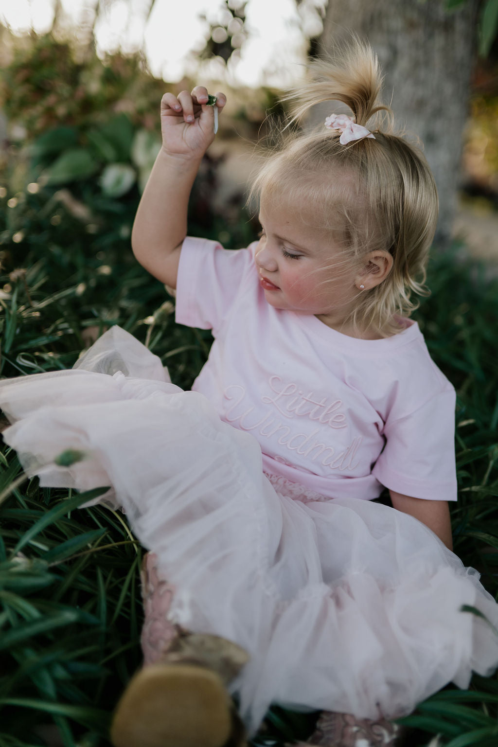 LIMITED EDITION embroidered kids tee soft pink flat lay showing full design