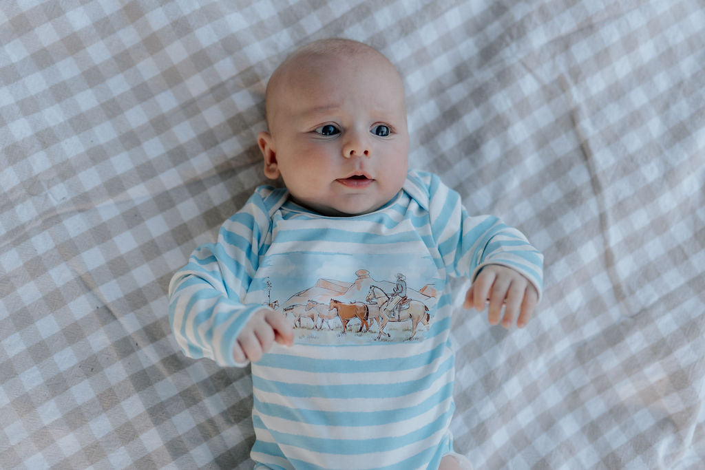 Colt blue stripe jumpsuit worn by child showing country casual playsuit style