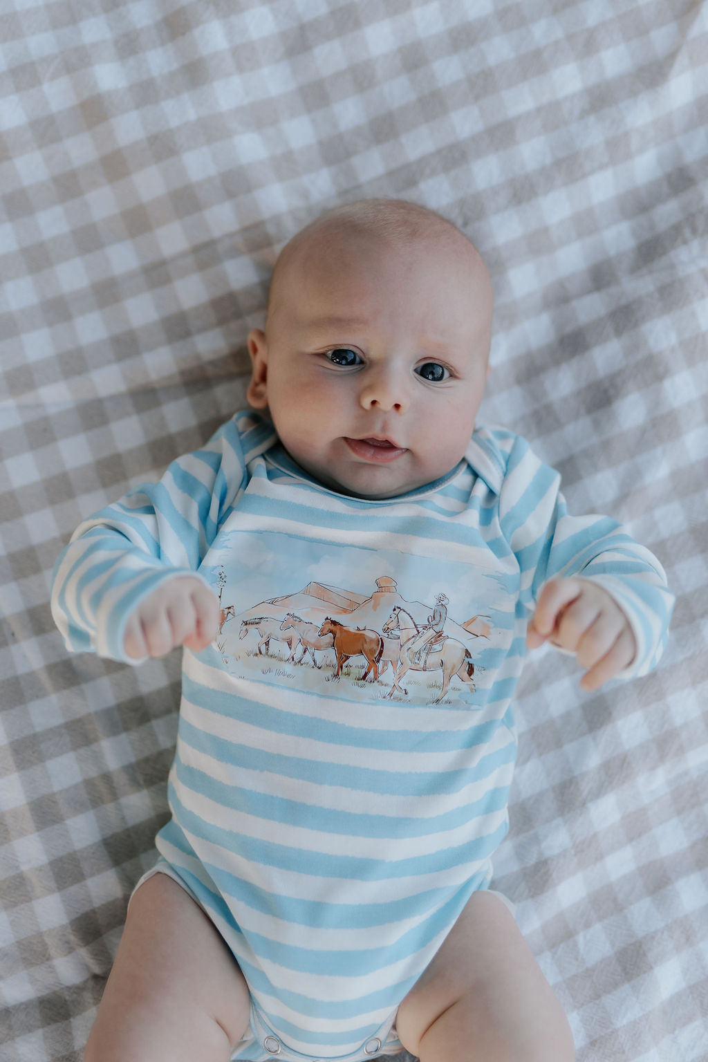 Colt blue stripe cotton jumpsuit back view showing comfortable cut and full stripe pattern