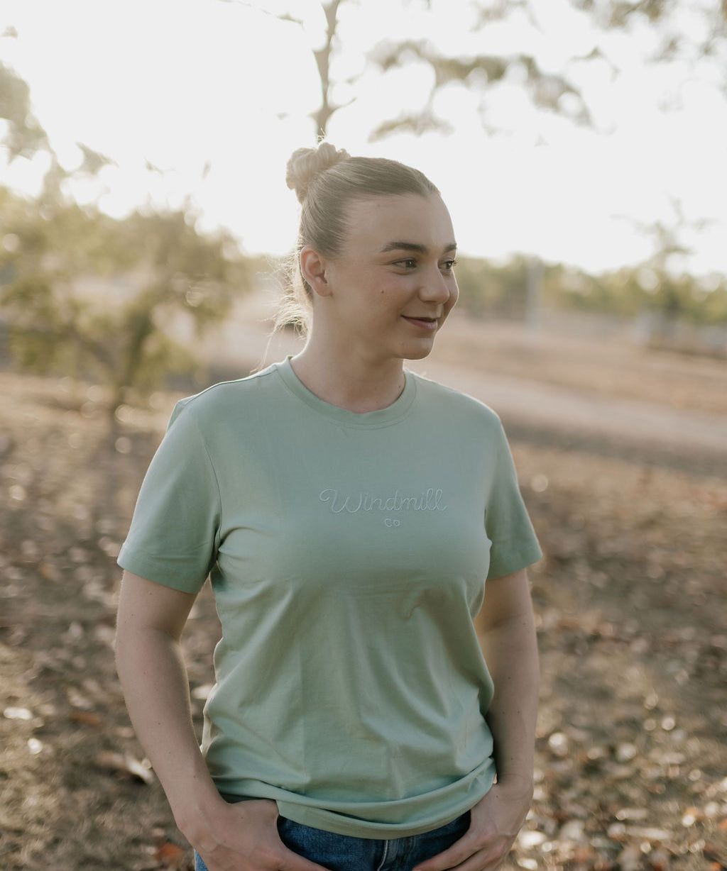 LIMITED EDITION embroidered ladies tee sage back view showing relaxed women's fit and sage green colourway