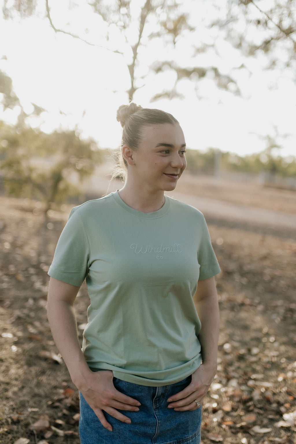 LIMITED EDITION embroidered ladies tee sage back view showing relaxed women's fit and sage green colourway