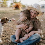 Clay Baby caramel romper worn by baby showing sweet country neutral style