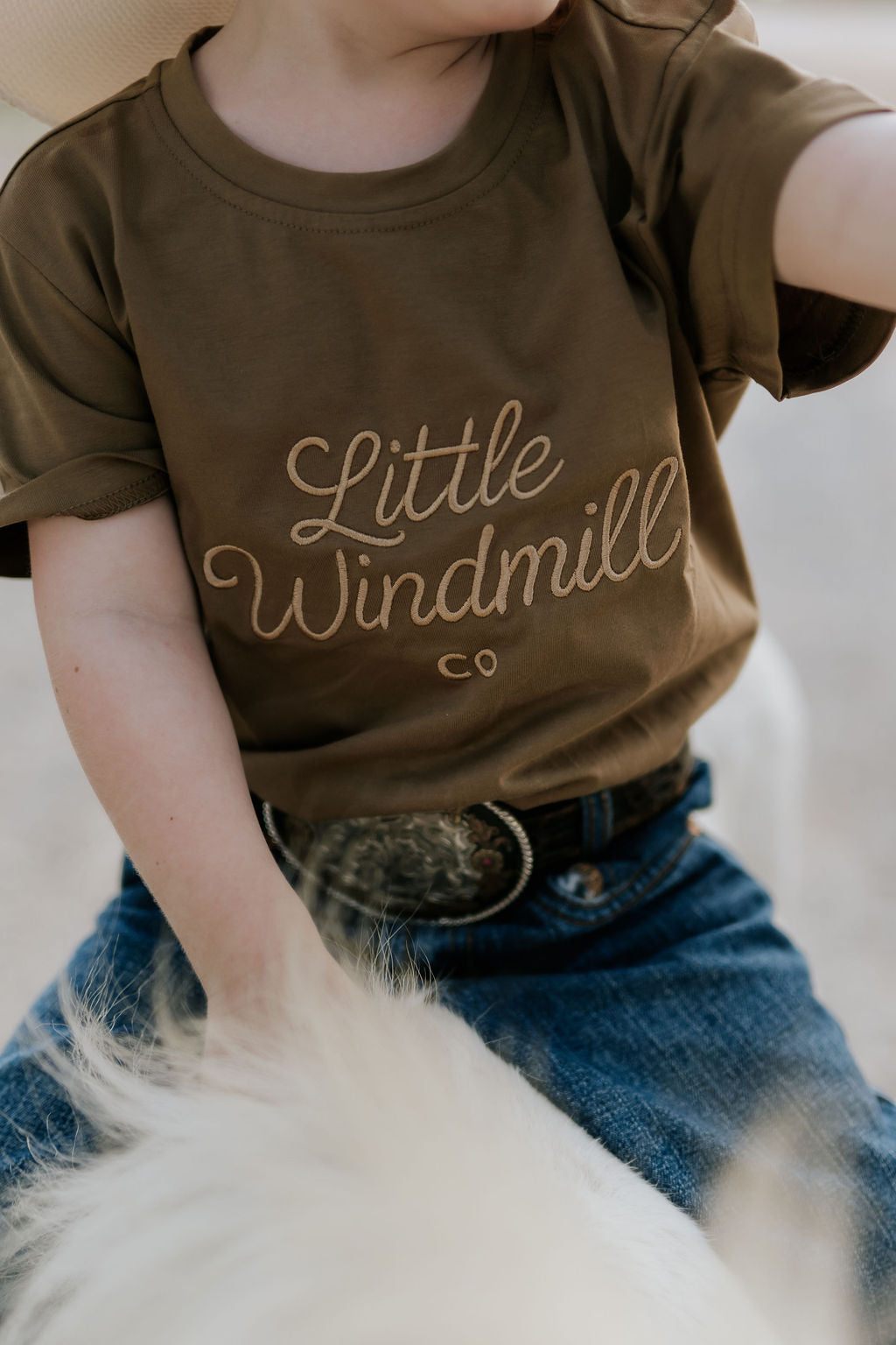 LIMITED EDITION embroidered kids tee dust brown back view showing relaxed fit and earthy dust brown