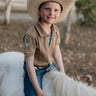 Clayton caramel boy's polo front view showing classic polo style in warm caramel tone for boys