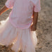 LIMITED EDITION embroidered kids tee soft pink front view showing signature LWCC embroidered logo on soft pink