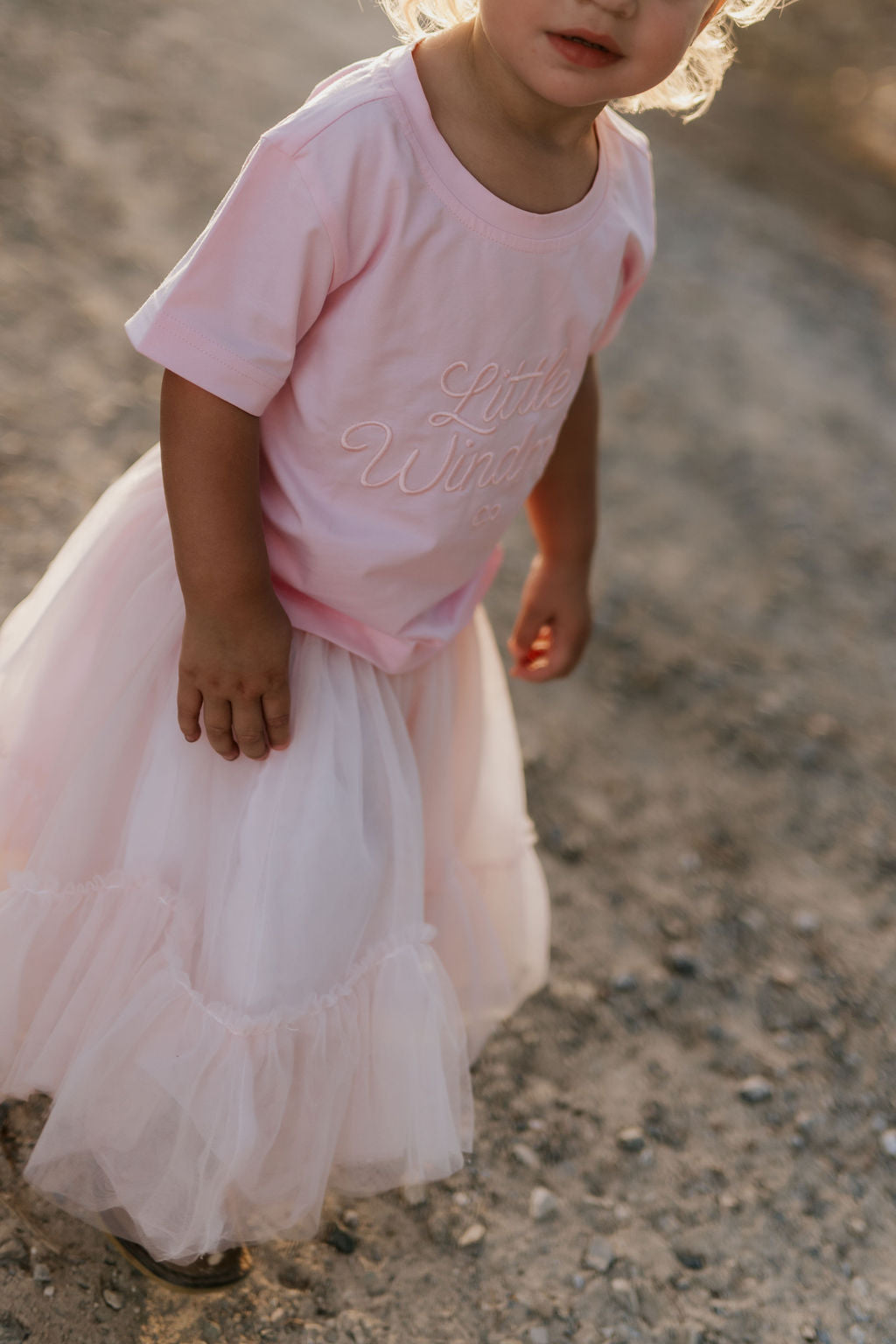 LIMITED EDITION embroidered kids tee soft pink collar detail showing premium quality
