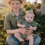 Ky Baby khaki green romper worn by baby showing adorable country neutral style