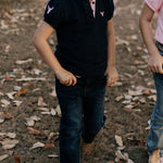 Little Windmill unisex bootcut jeans waistband detail showing quality denim waistband and belt loops