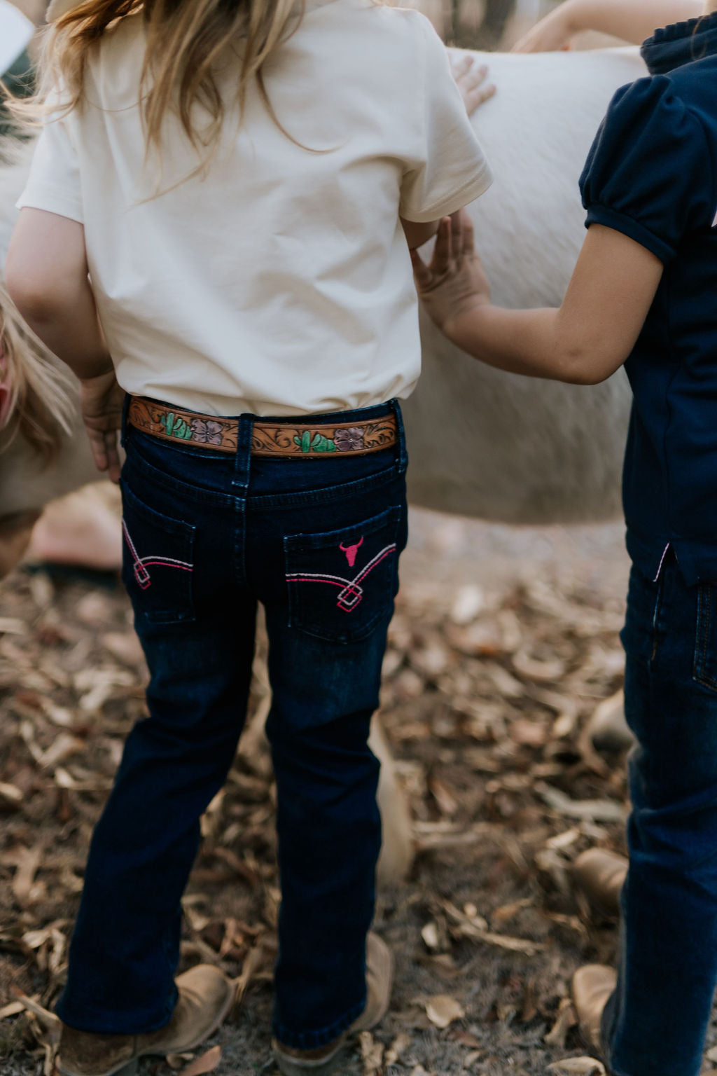 Little Windmill girls bootcut jeans leg detail showing bootcut flare and quality denim finish
