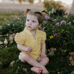 Larrisa Baby butter yellow polo romper collar detail close-up showing quality polo collar construction