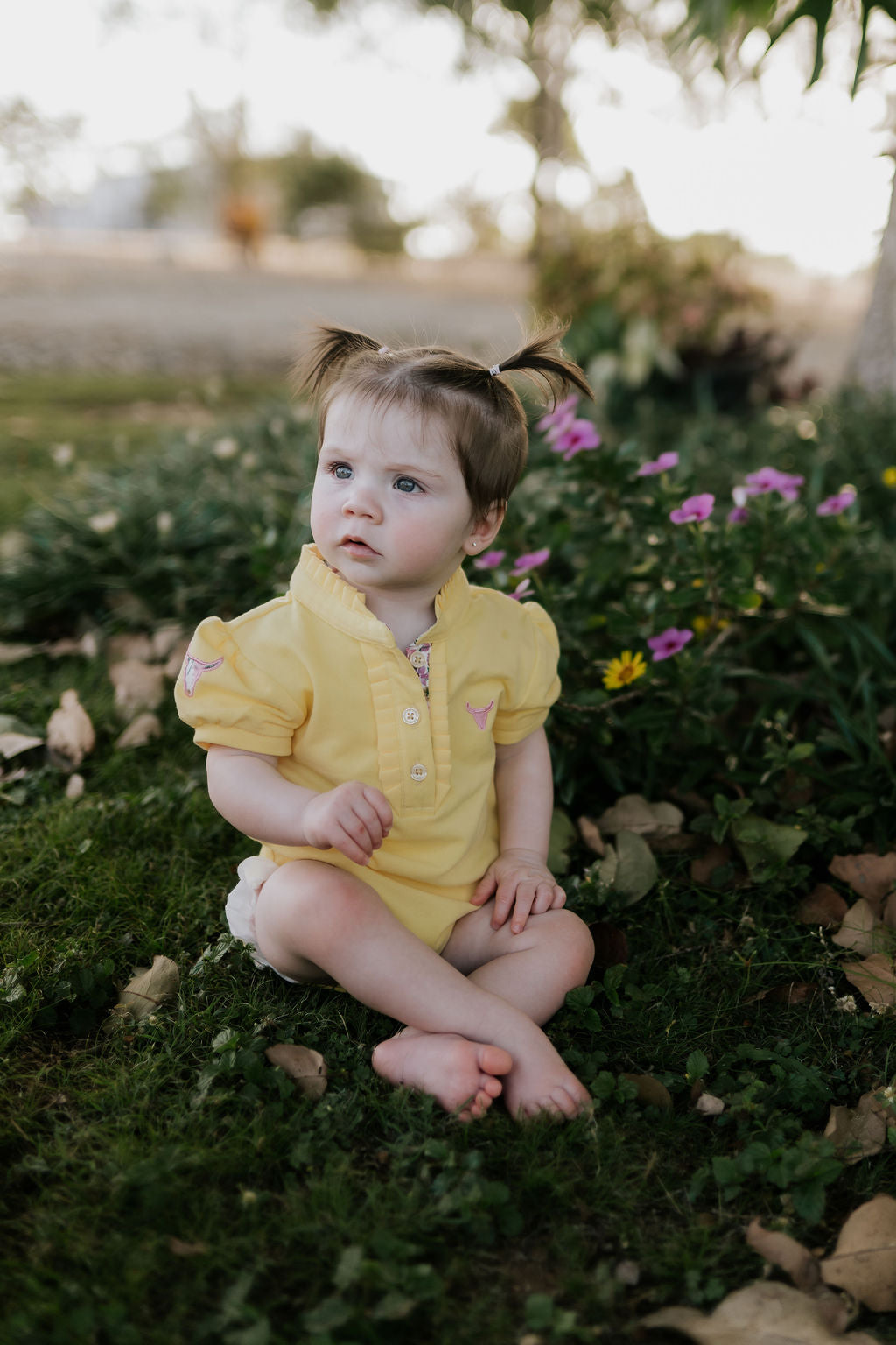 Larrisa Baby butter yellow polo romper collar detail close-up showing quality polo collar construction