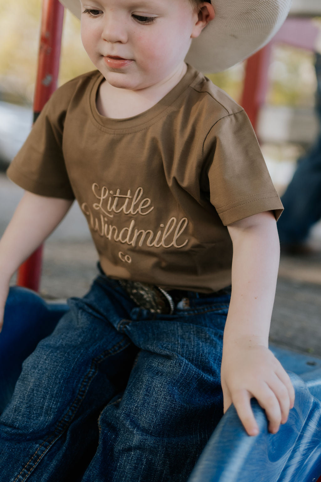 LIMITED EDITION embroidered kids tee dust brown worn by child showing boutique quality country style