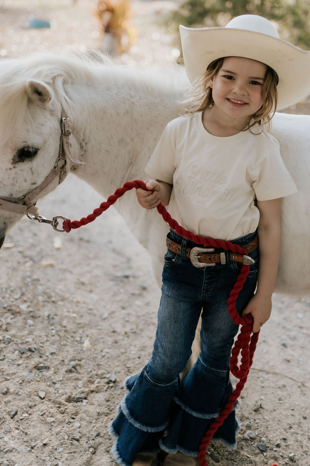 LIMITED EDITION embroidered kids tee cream back view showing relaxed fit and timeless cream colourway