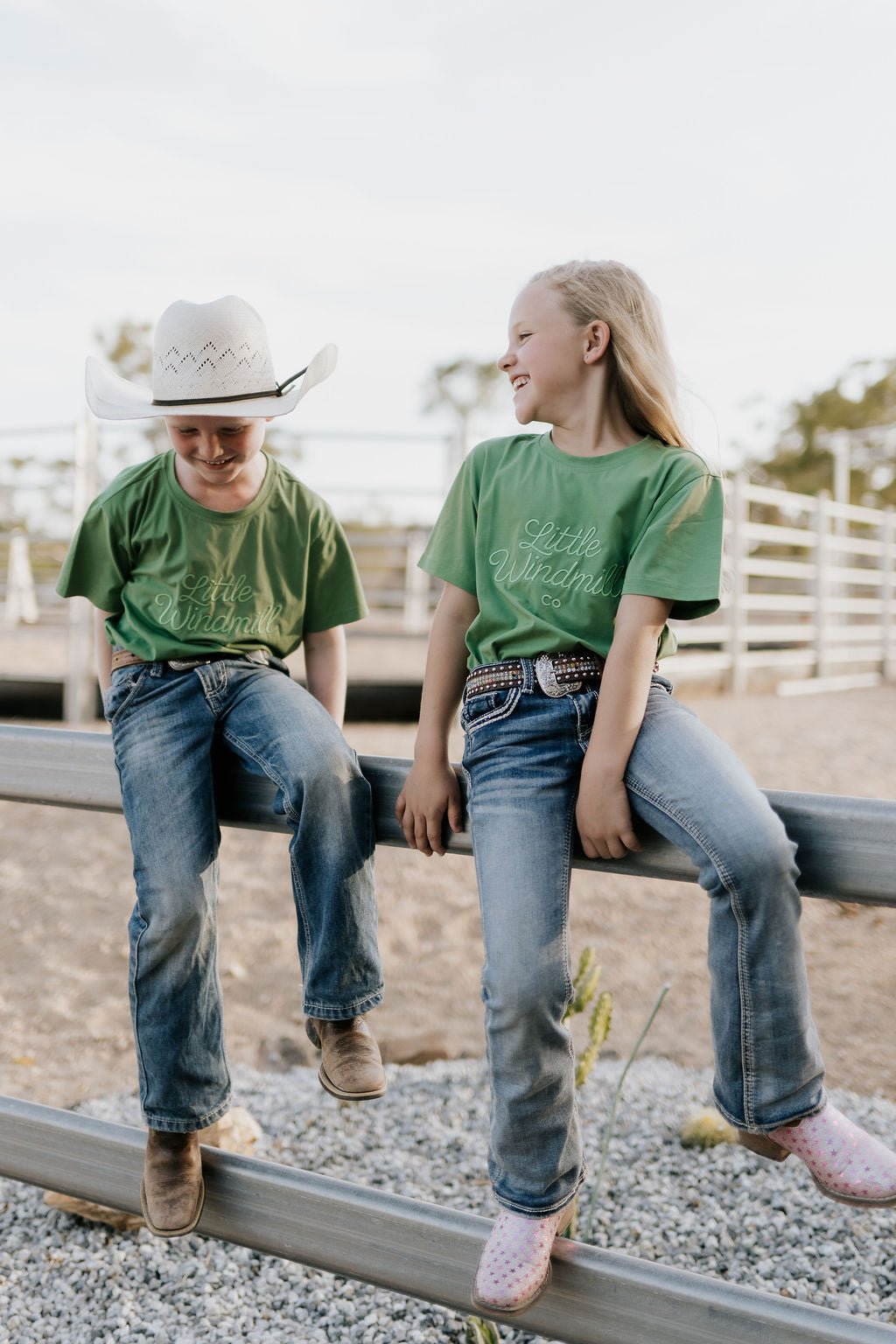 LIMITED EDITION embroidered kids tee moss green embroidery close-up showing detailed LWCC logo stitch