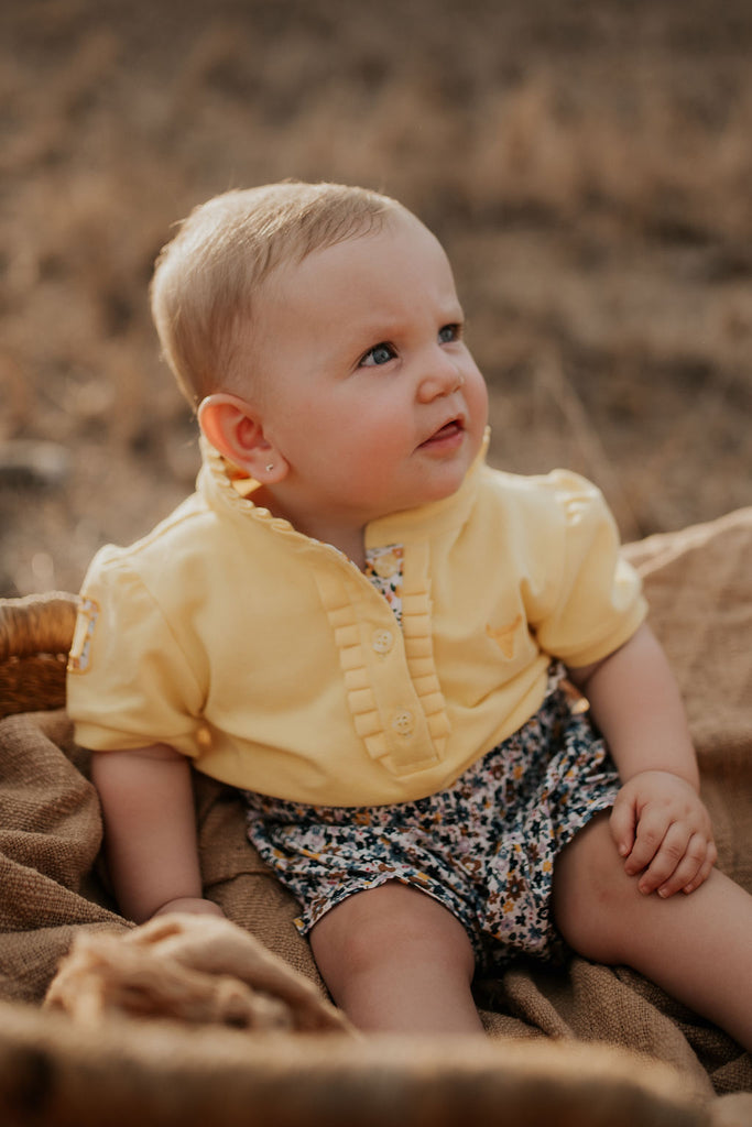 "Andrea" Lemon Butter Floral Contrast Baby Polo Romper-Little Windmill Clothing Co