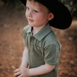 Keith khaki green boy's polo flat lay showing full design in earthy khaki green