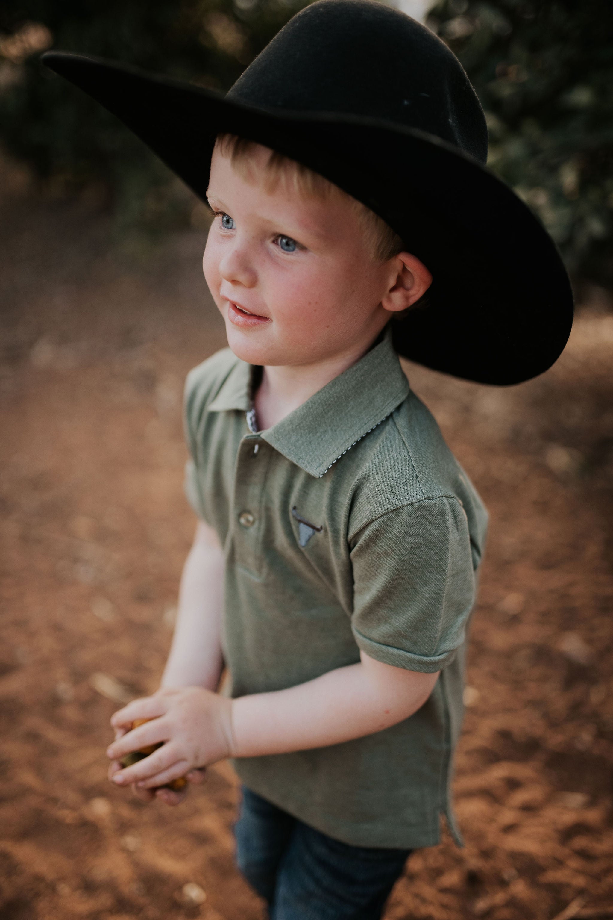 Keith khaki green boy's polo flat lay showing full design in earthy khaki green