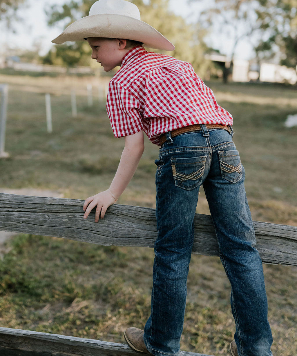 Albie deep red short sleeve shirt worn by boy showing smart country casual style