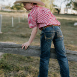 Albie deep red short sleeve shirt worn by boy showing smart country casual style