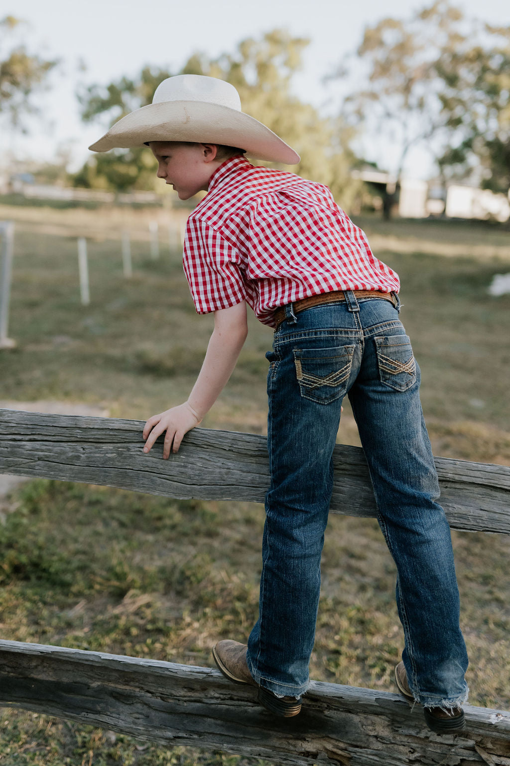 Albie deep red short sleeve shirt worn by boy showing smart country casual style