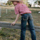 Albie deep red short sleeve shirt worn by boy showing smart country casual style