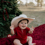 Nicco Baby deep red polo romper back view showing snap closure and cute baby fit