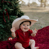 Nicco Baby deep red polo romper back view showing snap closure and cute baby fit