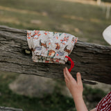 Western Christmas PJ set showing coordinating top and bottom pieces in holiday western print