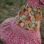 Penelope block twirl dress side view showing full layered skirt volume