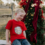 Western printed Christmas cow tee front view showing festive Christmas cow and western holiday print