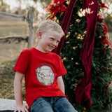 Western printed Christmas cow tee front view showing festive Christmas cow and western holiday print