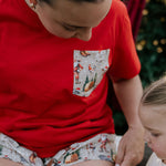 Kids Western Christmas PJ set worn showing festive matching pyjama set in western holiday print