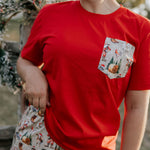 Ladies Western Christmas PJ set flatlay showing festive western print women's pyjama top and pants