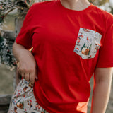 Ladies Western Christmas PJ set flatlay showing festive western print women's pyjama top and pants