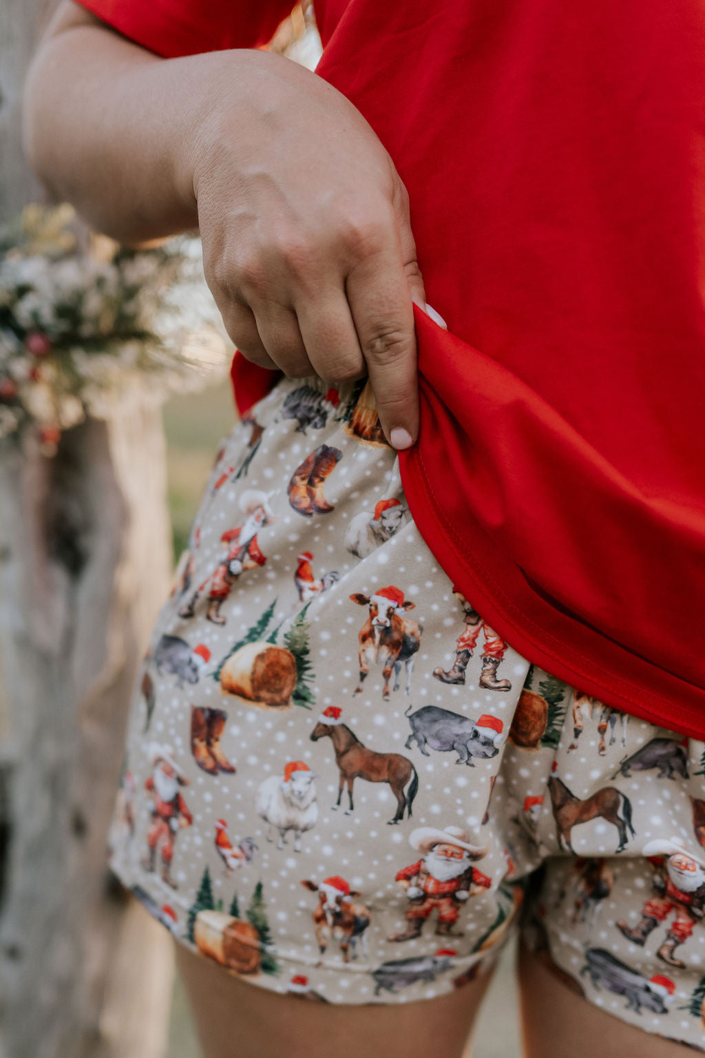 Western Christmas PJ set print close-up showing detailed festive western holiday print