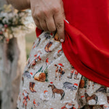 Western Christmas PJ set print close-up showing detailed festive western holiday print