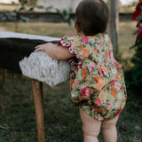 Faith floral scallop short sleeve romper front view showing sweet floral print scalloped romper for girls