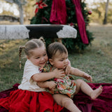 Rena deep red textured tutu side view showing full layered tutu volume in rich deep red