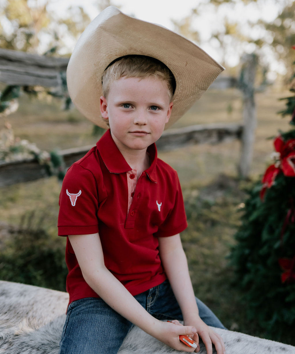 Nick deep red boys polo shirt front view showing classic deep red polo for boys