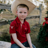 Nick deep red boys polo shirt front view showing classic deep red polo for boys