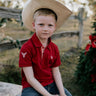 Nick deep red boys polo shirt front view showing classic deep red polo for boys