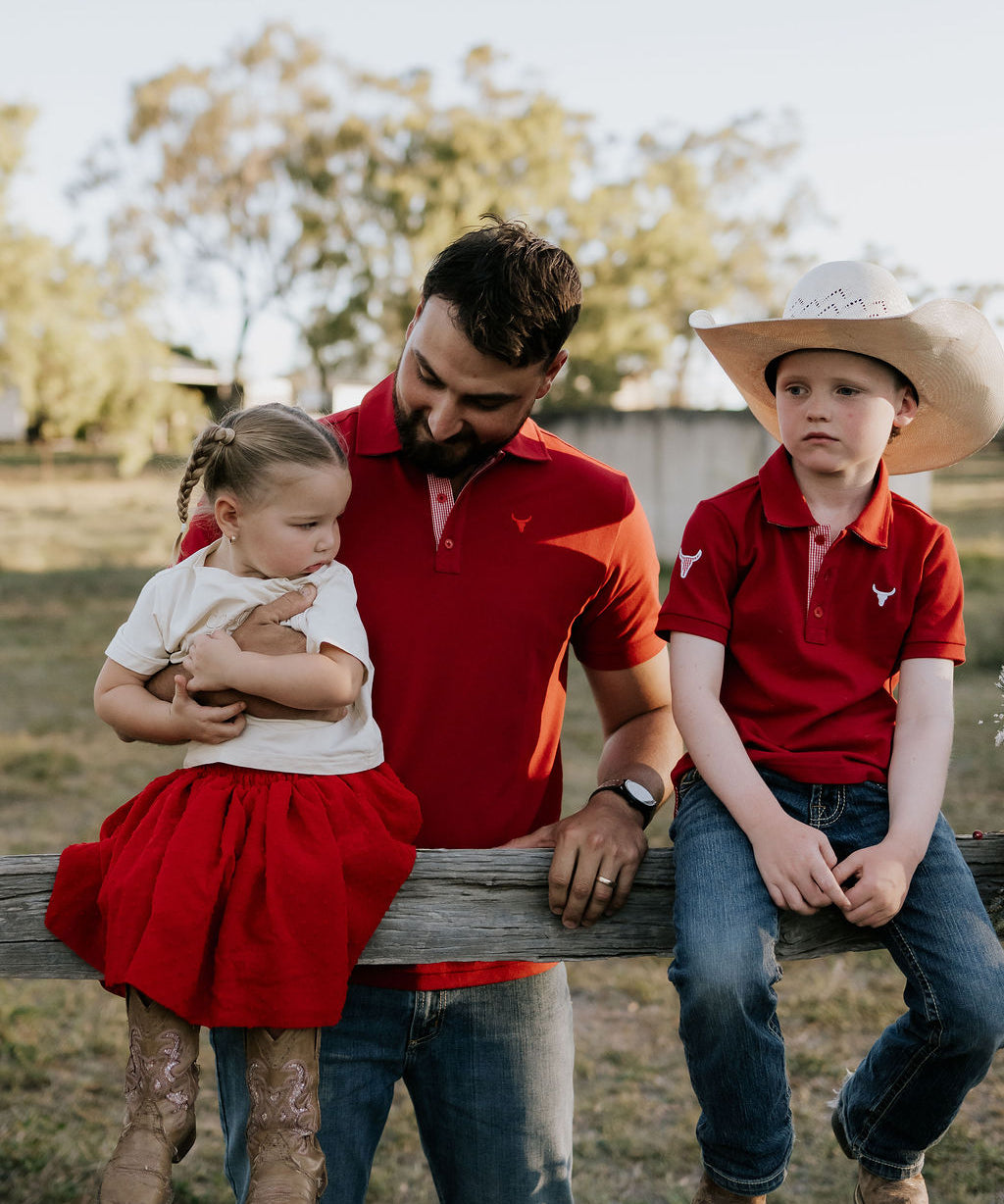 Deep red polo shirt collar detail showing classic polo neckline in rich deep red