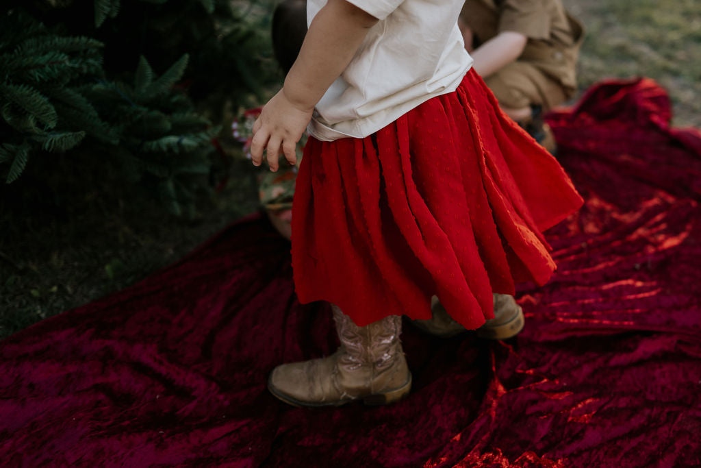 Rena deep red textured tutu back view showing full layered tulle skirt in deep red