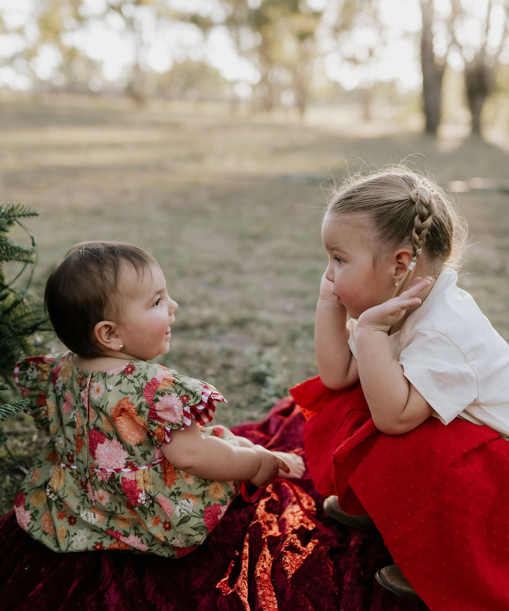 Rena deep red textured tutu worn by girl showing beautiful deep red tutu skirt
