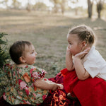 Rena deep red textured tutu worn by girl showing beautiful deep red tutu skirt