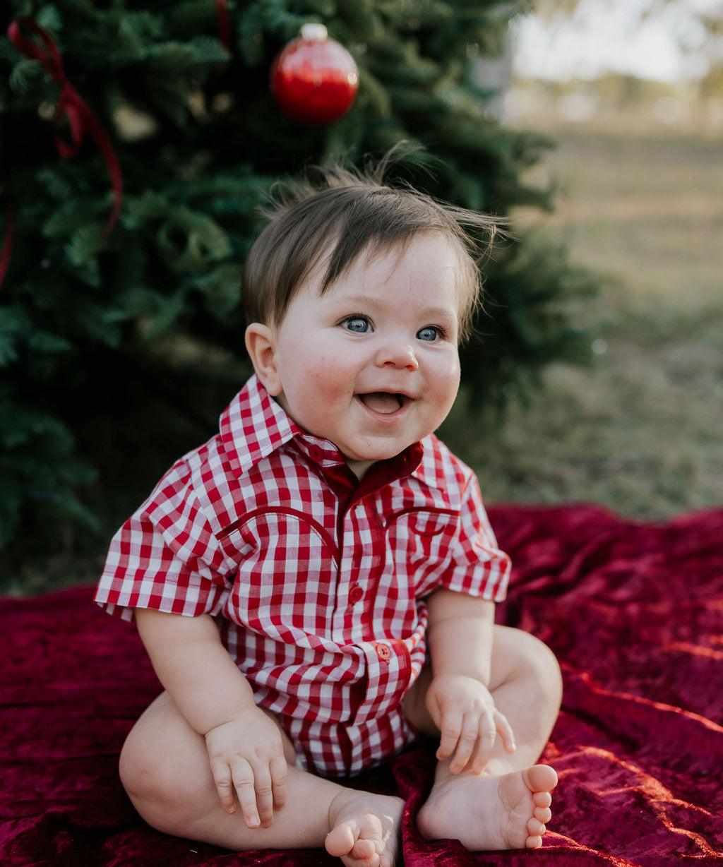 Barnley deep red checked short sleeve romper worn by toddler showing sweet country western style