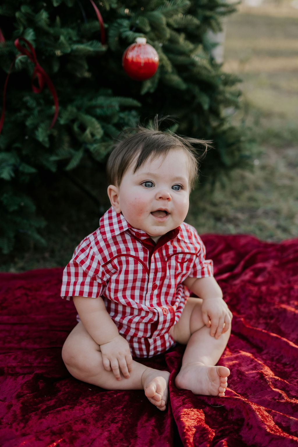 Barnley deep red checked short sleeve romper snap detail showing quality press stud closure